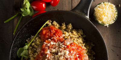 Vibrant tomato and quinoa dish photographed for a cook book
