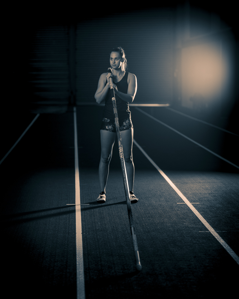 Moody black and white athletic portrait of a pole vaulter captured in Auckland, New Zealand