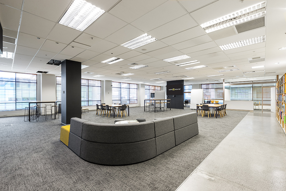 Office fit out photographed in Auckland with curved couch. Captured for the fit out company