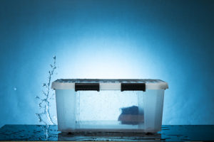 getting creative from within the image to get water splash which looks like it is behind the storage box 