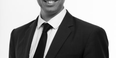 black and white headshot captured in Auckland CBD