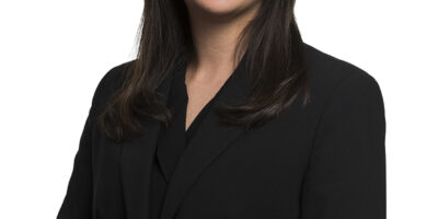 Studio headshot of woman on white background, captured in Auckland New Zealand