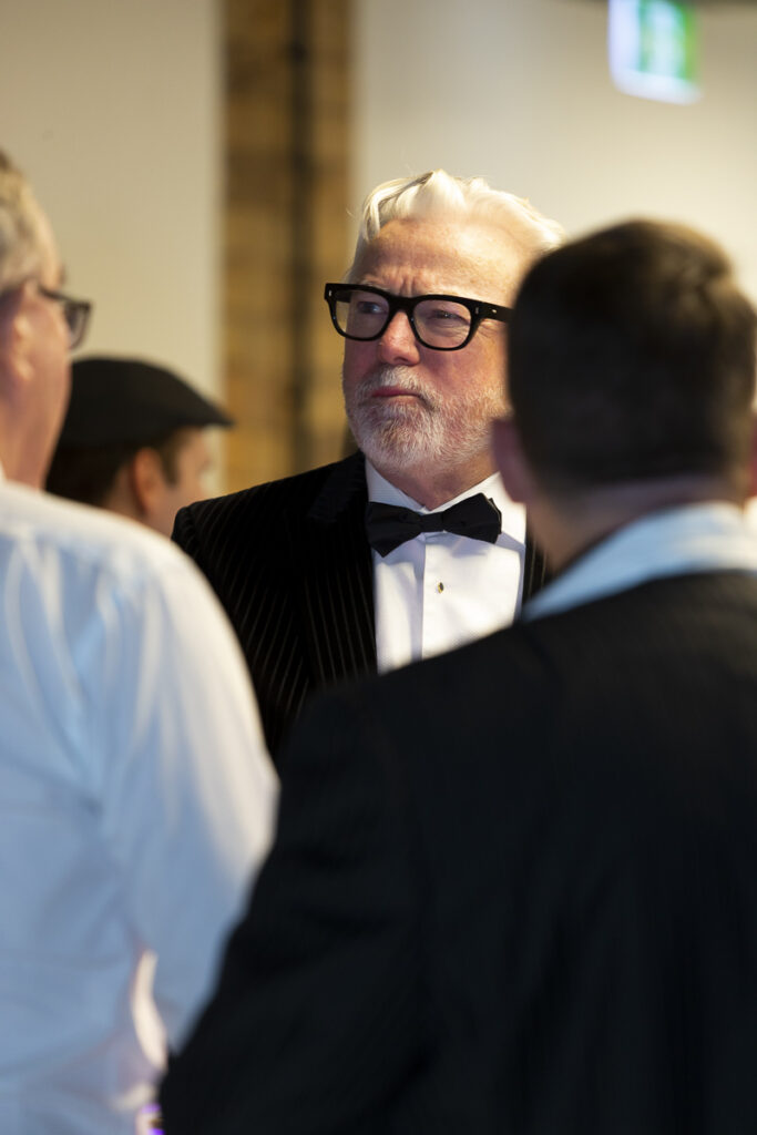 man in tuxedo photographed during an Auckland business event evening