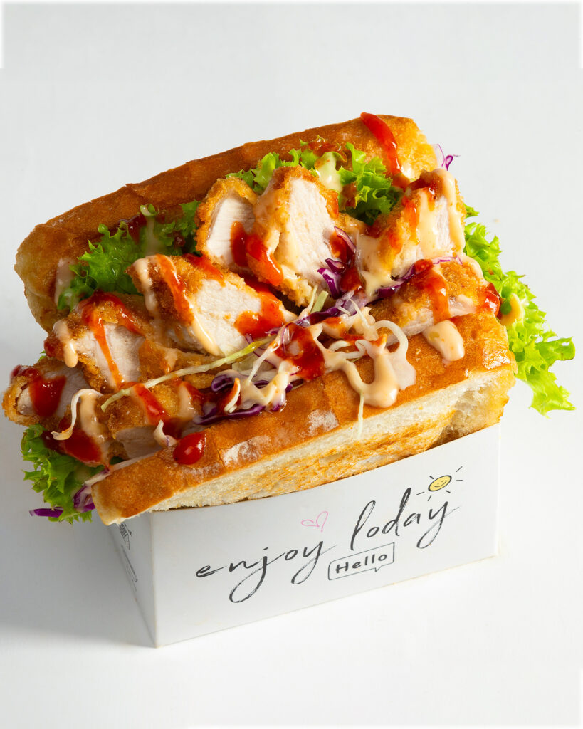 Example image of Simple menu images of a loaded chicken toasted sandwich on a white background for background removal in post processing