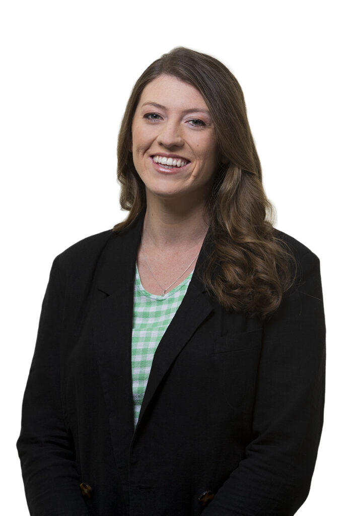 Plain white background headshot captured in Auckland offices