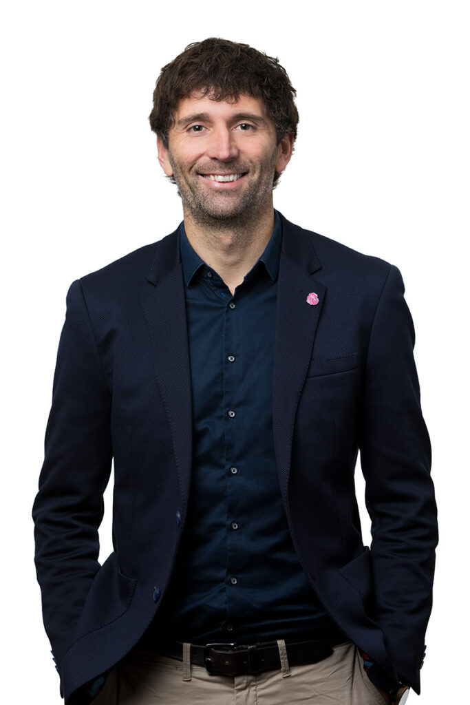 Studio style headshot captured in Auckland offices by Professional headshot photographer Adam Firth